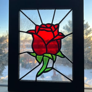 Stained glass rose panel.