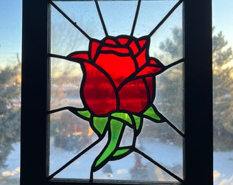 Stained glass rose panel.