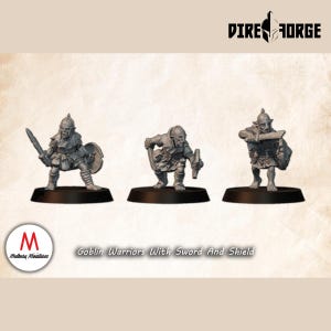 Op de afbeelding: Drie grijze Goblin Warrior miniaturen met zwaarden en schilden op zwarte bases. De tekst "Goblin Warriors With Sword And Shield" staat eronder. Het Dire Forge-logo staat rechtsboven. Miniaturen voor tabletop games.