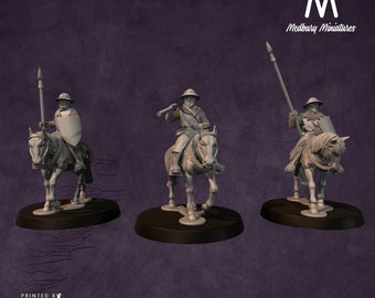 May include: Three gray plastic miniature figures of mounted knights, each riding a horse and holding a weapon. The figures are on circular bases. The figures are from Medbury Miniatures.