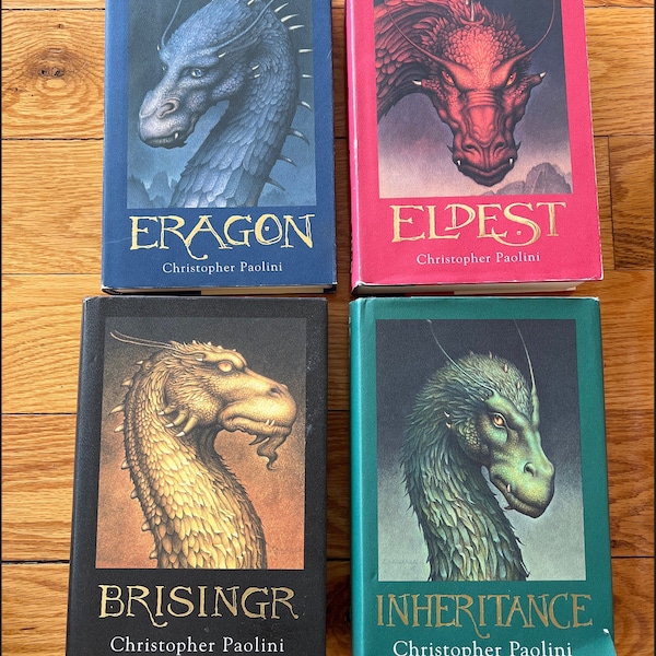 Eragon, Eldest, Brisingr, Inheritance by Christopher Paolini First edition ( Eragon signed copy) Full set