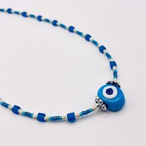 Evil eye choker necklace, blue gradient seed beads, with hand crafted blue evil eye bead and matte blue cube beads, dainty necklace, unisex