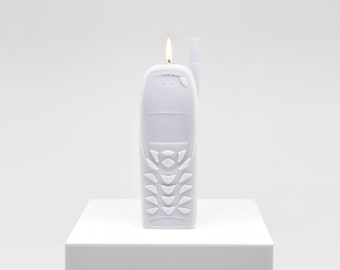 Candle replica of a cell phone