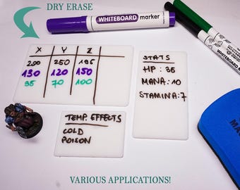 May include: Whiteboard markers and dry erase boards with handwritten notes and charts. The boards display data labeled X, Y, and Z, along with stats for HP, Mana, and Stamina. The text "DRY ERASE" and "VARIOUS APPLICATIONS!" are also visible.