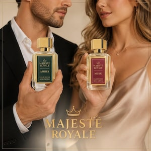 May include: Two rectangular glass perfume bottles with gold caps. One bottle features a dark green label with the text Majesté Royale Amber, 50 ml 1.69 fl oz. The other features a maroon label with the text Majesté Royale Musk, 50 ml 1.69 fl oz.