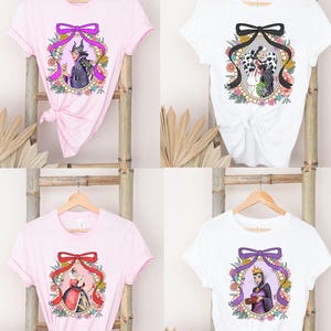 悪役ファッション T シャツ、マレフィセント シャツ、クルエラ T シャツ、アースラ T シャツ、邪悪な女王 T シャツ。