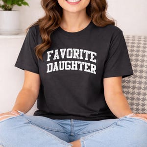 May include: A set of three ceramic nesting bowls in shades of blue, green, and white. The bowls have a speckled glaze and a simple, modern design. The largest bowl is about 15 cm in diameter.