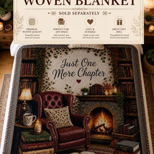 May include: A woven blanket featuring a printed scene of a library with a fireplace, a leather armchair, and stacks of books. The text "Just One More Chapter" is centered above the chair. The blanket has a fringed edge and a detailed, colorful design.