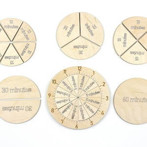 May include: Five wooden circles divided into sections, each showing different time increments. The circles show 10 minutes, 15 minutes, 20 minutes, 30 minutes, and 60 minutes. One circle is divided into 12 sections, each showing 5 minutes.