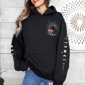 Mystical Raven Hoodie Moon Phase Hoodie Celestial Sweatshirt Witchy Shirt Moon and Stars Sweater Peony Flower Black Bird Top Astrology Gift