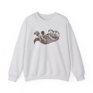 Sea Otter Sweatshirt Hand Drawn Brown Otters Sweater Unisex Fleece Top Graphic Sweat Shirt Animal Lover Gift Ideas Pastel Pink Nature Ash