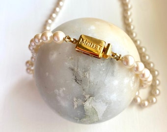 Vintage Monet pearl choker necklace with triple gold plated clasp in pristine condition from LOLO Modern Vintage