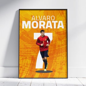 May include: A poster featuring a soccer player in a red and blue uniform with the name "ALVARO MORATA" in white text on a yellow background.