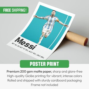 May include: A poster print featuring a soccer player in a blue and white uniform, with the name "Messi" in large letters. The poster has a teal background and includes the text "POSTER PRINT". The poster is rolled and shipped in sturdy cardboard packaging.