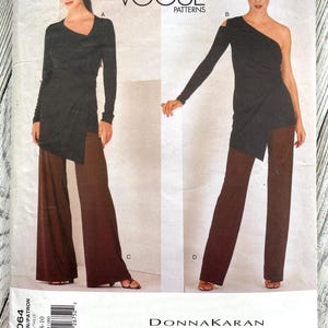 May include: Vogue Patterns 2064 Donna Karan New York sewing pattern envelope featuring two views of a long-sleeved black top with an asymmetrical hem paired with wide-leg brown trousers. The pattern is sized 6-8-10 for creating these garments.