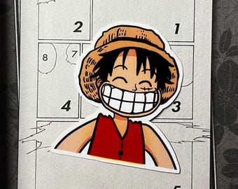 May include: A sticker featuring a smiling cartoon character with a straw hat and red vest, set against a comic book panel background. The character has black hair and a wide grin. The background is a grayscale comic strip.