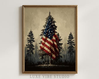 May include: Framed art print featuring an American flag draped over a tree in a forest setting. The flag displays red and white stripes with a blue field of stars. The artwork has a vintage, painterly style, with a gold-colored frame.
