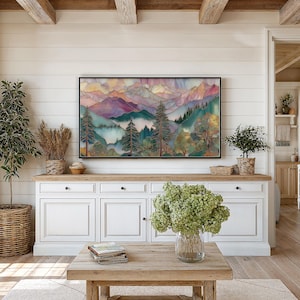 Serene nature-inspired TV art for home office — vibrant stained-glass mountains and reflective lake create a tranquil atmosphere.