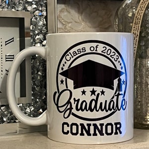 Personalised graduate class of 2023 mug 11oz. With name university and degree. Perfect keepsake. Graduation gift.