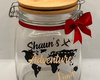 Personalised Adventure glass jar Money Box . Piggy bank with money slot.