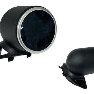 May include: Black automotive gauge with a silver bezel and a black housing. The gauge is mounted on a black bracket. A separate black housing is also present.