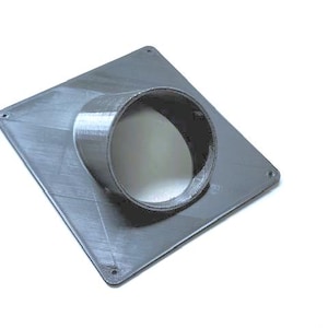 May include: A gray plastic square with a round hole in the center. The hole is surrounded by a gray plastic ring.