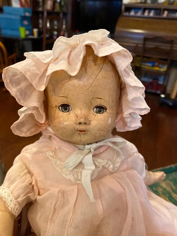 Antique 1920’s-1940’s 13” Crier Composite Baby Doll With Working Sleeper Eyes Wearing Long Pink Dress With Ruffled Pink Bonnet, Head Crazing