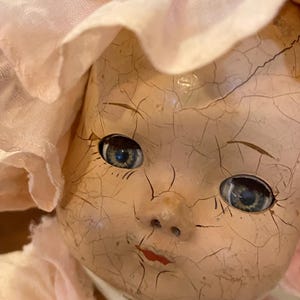 Antique 1920’s-1940’s 13” Crier Composite Baby Doll With Working Sleeper Eyes Wearing Long Pink Dress With Ruffled Pink Bonnet, Head Crazing image 3