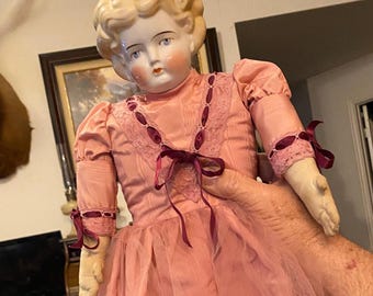 Antique Beautiful Blonde  Late 1800’s-Early 1900’s Germany Doll With Porcelain/Bisque Head and Stuffed Cloth Body and a Beautiful Pink Dress