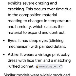 May include: A vintage doll with a composition head and limbs featuring visible crazing and cracking. The doll has sleep eyes with painted details and wears a pink baby dress with lace trim and a matching ruffled bonnet, reflecting mid-century design.
