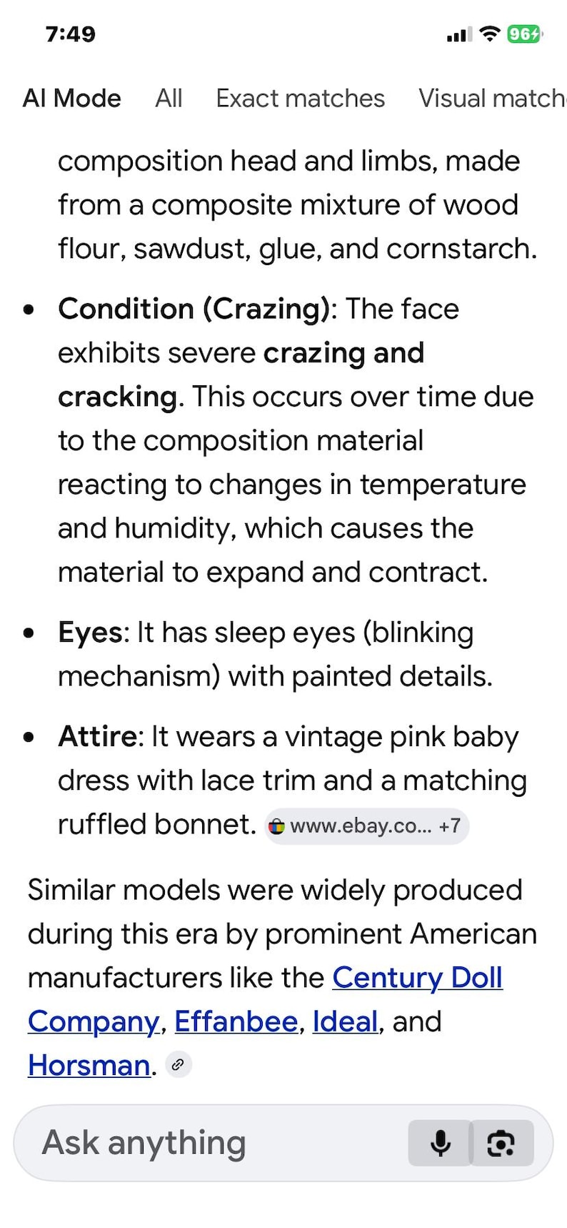 May include: A vintage doll with a composition head and limbs featuring visible crazing and cracking. The doll has sleep eyes with painted details and wears a pink baby dress with lace trim and a matching ruffled bonnet, reflecting mid-century design.