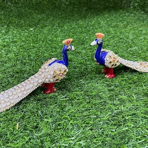 Beautiful peacock set  / height is 3.5 inches / pearl work  / home and temple decor