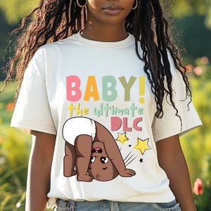 Funny Video Gamer Pregnancy Shirt, Oversized Unisex Gamer T-Shirt, Perfect Gift for Pregnant Gamer Moms, Dark Skin Tone Baby Graphic