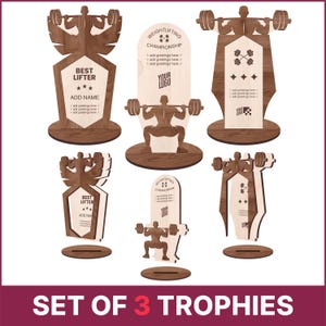 Puede incluir: Juego de 3 trofeos de madera con temas de halterofilia. Cada trofeo presenta una silueta de levantador y espacio para personalización. El texto incluye "BEST LIFTER" y "WEIGHTLIFTING CHAMPIONSHIP".