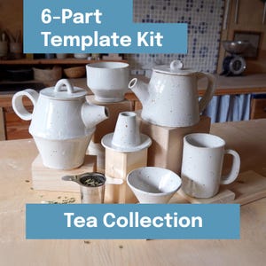 May include: A white ceramic tea set with a speckled design. The set includes two teapots, a mug, a bowl, a cup, and a tea infuser. The text "6-Part Template Kit" and "Tea Collection" are displayed in blue rectangles.