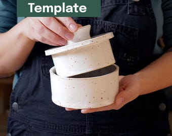 May include: A white ceramic butter dish with a lid, speckled with brown dots. The dish is round and has a matching lid with a handle. The text "Printable Template" is in a green rectangle in the upper left corner.