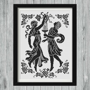 May include: Black and white silhouette cross stitch pattern of two figures in flowing robes, holding a goblet and grapes, framed in a black frame.