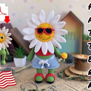 May include: Crochet amigurumi pattern for a daisy doll wearing sunglasses and a red and blue outfit. The doll is holding a lollipop. The pattern is available as a PDF download.