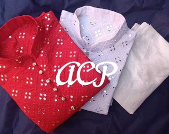 May include: Two white and red shirts with mirror work embroidery and a white plain fabric. The shirts have a mandarin collar and are made of a lightweight fabric.