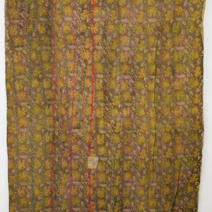May include: A large, rectangular textile featuring a floral pattern in olive green and yellow. Vertical stripes in red and purple run down the length of the fabric. The textile appears handmade, with a vintage aesthetic.