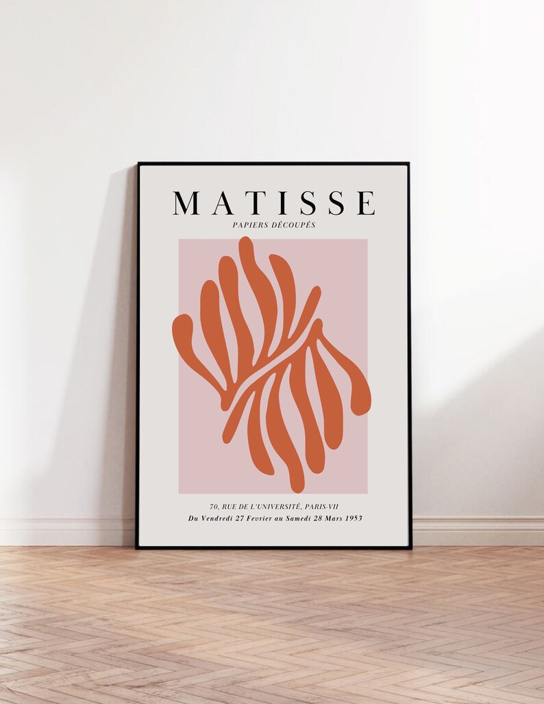 May include: A black and white poster with the text "MATISSE PAPIERS D&Eacute;COUP&Eacute;S" and a red abstract design on a pink background. The text at the bottom reads "70, RUE DE L'UNIVERSIT&Eacute;, PARIS-VII Du Vendredi 27 Fevrier au Samedi 28 Mars 1953."