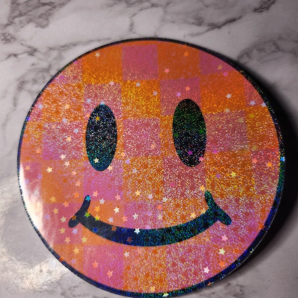 Adorable Holographic Vinyl Pink and Orange Checker Print Smiley Face Sticker - Great for Waterbottles, Laptops, & Planners