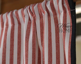 May include: Red and white striped curtain panel with a black border. The curtain is made of a textured fabric and is hanging from a wooden rod. The text "Weave HOME" is visible on the curtain.