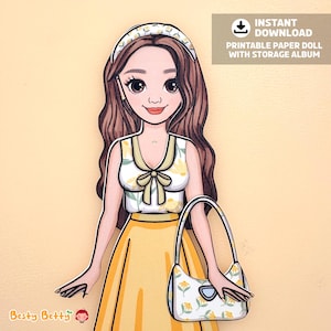May include: A paper doll illustration of a woman in a yellow skirt and floral top, holding a matching purse. The doll has long brown hair and a headband. Text on the image reads "Instant Download Printable Paper Doll with Storage Album."