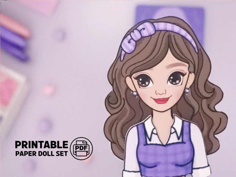 May include: Printable paper doll set featuring a girl with brown hair, wearing a purple and white dress and a purple headband with a bow. The text "Printable Paper Doll Set" is visible in the bottom left corner of the image.