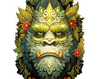 May include: A sticker depicting a detailed illustration of a gorilla-like creature's face. The face is predominantly green and blue, with yellow eyes and accents. The design incorporates floral and leaf elements, with orange flowers and a crown-like structure.