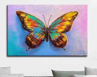 May include: A colorful butterfly painting with yellow, blue, green, and brown accents on a light blue and purple background.