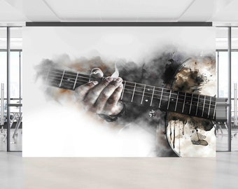 May include: A watercolor painting of a hand playing an acoustic guitar. The guitar is in focus, and the hand is blurred. The background is a white canvas with splashes of brown and black paint.