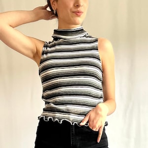 Striped sleeveless turtleneck top