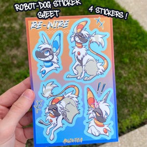 May include: A rectangular sticker sheet featuring four distinct illustrations of a stylized robot dog character. The sheet includes the text "RE-WIRE" and "ANZUTEA" with a gradient orange and blue background. Each sticker has a blue border.